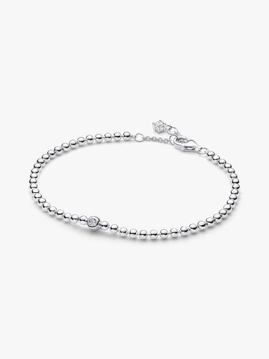 Sølvkugler og Funklende Steiner Armbånd