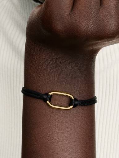 Armbånd med ledd og snor