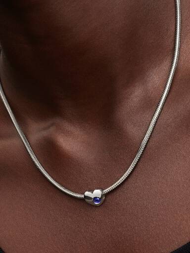 Hjerteformet Charm med Blå Stein